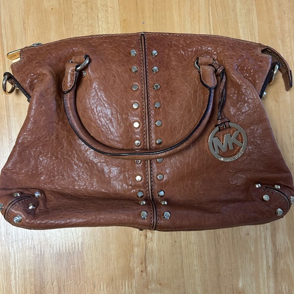 Michael Kors Handbags - Michael Kors Brown Studded Leather Satchel with Logo Charm